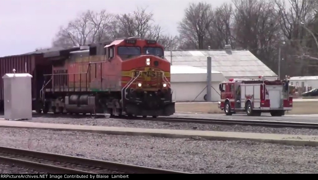 BNSF Geometry passes by a firetruck 